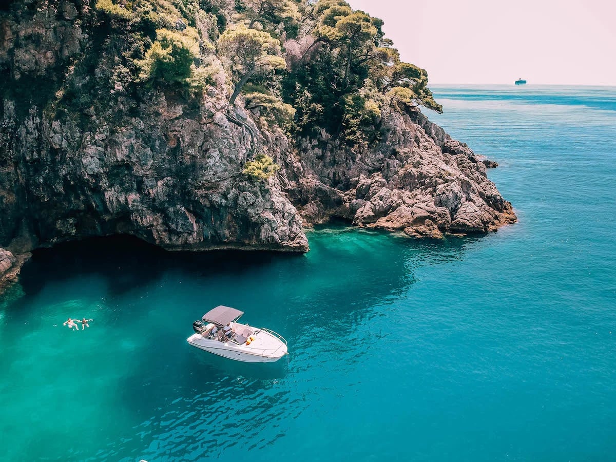 The My Dream boat anchored in a turquoise bay near Dubrovnik