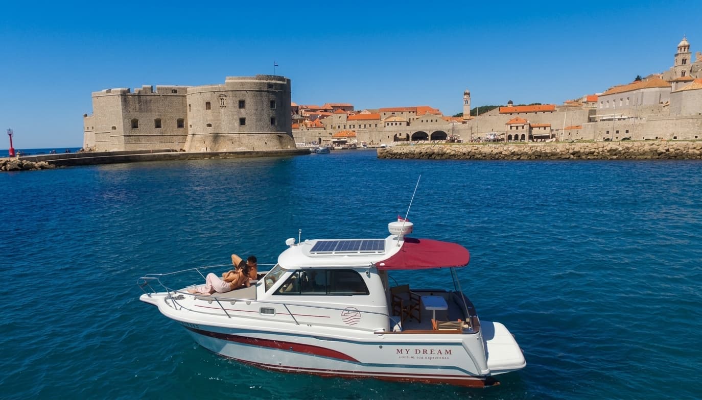 The My Dream boat in front of the Dubrovnik city walls and Bokar fortress